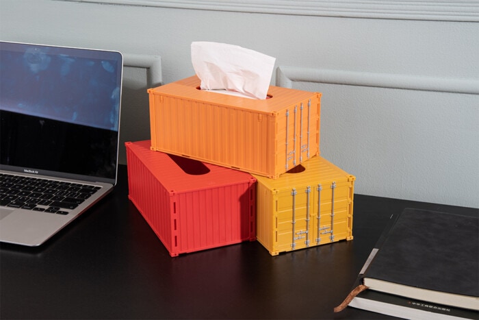 Porte-serviettes en forme de conteneur