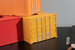 Porte-serviettes en forme de conteneur