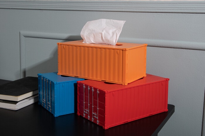 Porte-serviettes en forme de conteneur